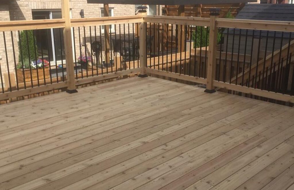 Timber deck with matching railings and privacy screening